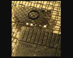 Bug sized aircraft flies by light the low mass high thermal conductivity of the device enable it to levitate by forcing heated air through the channels of its structure